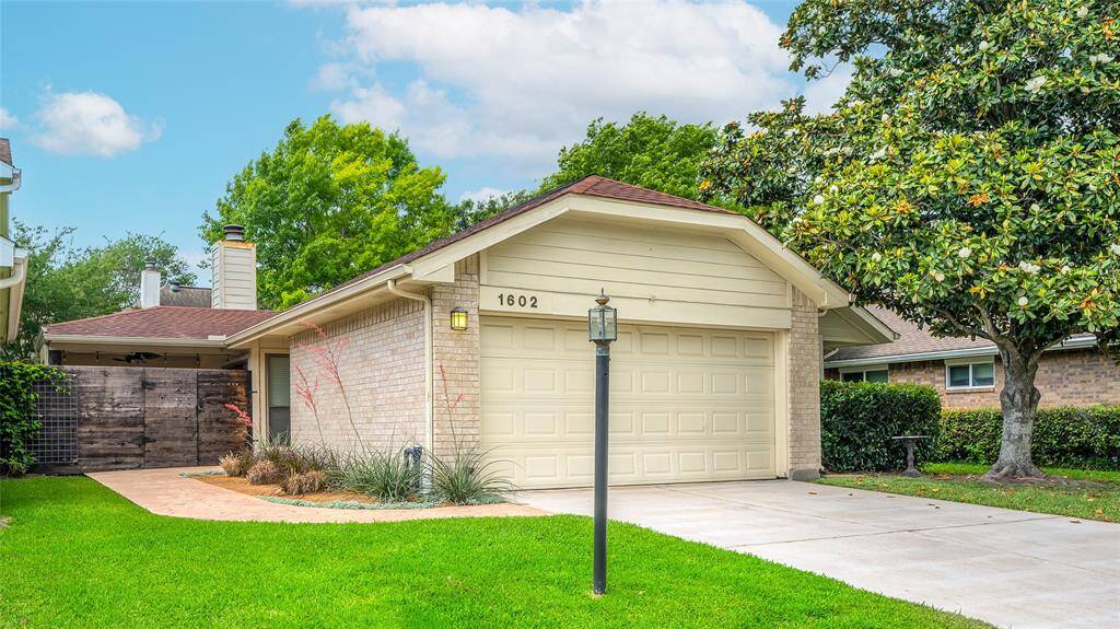 Beautiful move-in ready Ashford Hills home with a great yard and upgrades.