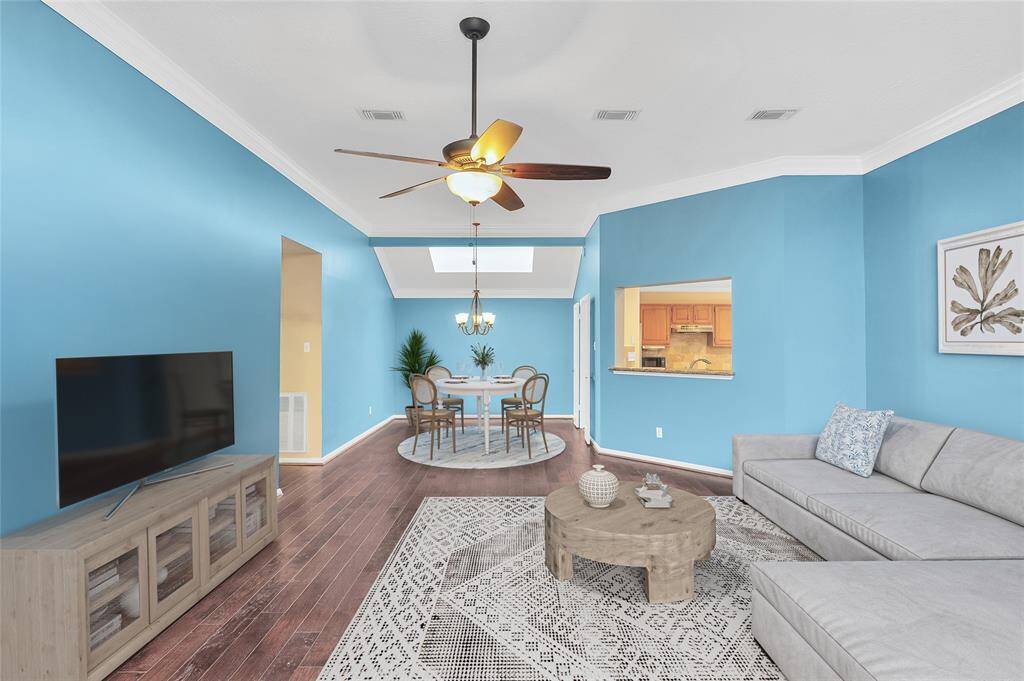 The living and dining area, virtually staged for inspiration.