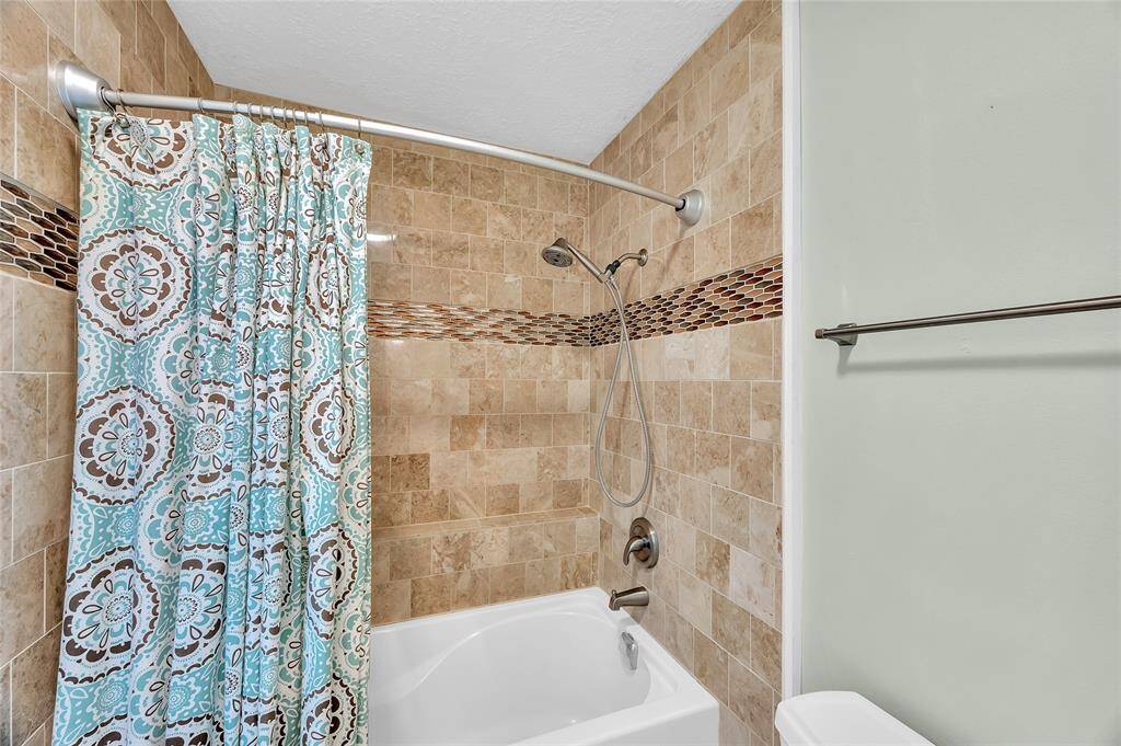 Soaking tub and shower in the primary bath.