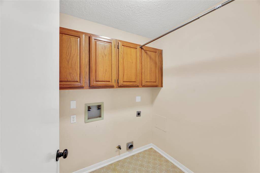 Laundry room with electric and gas connections for your washer & dryer.