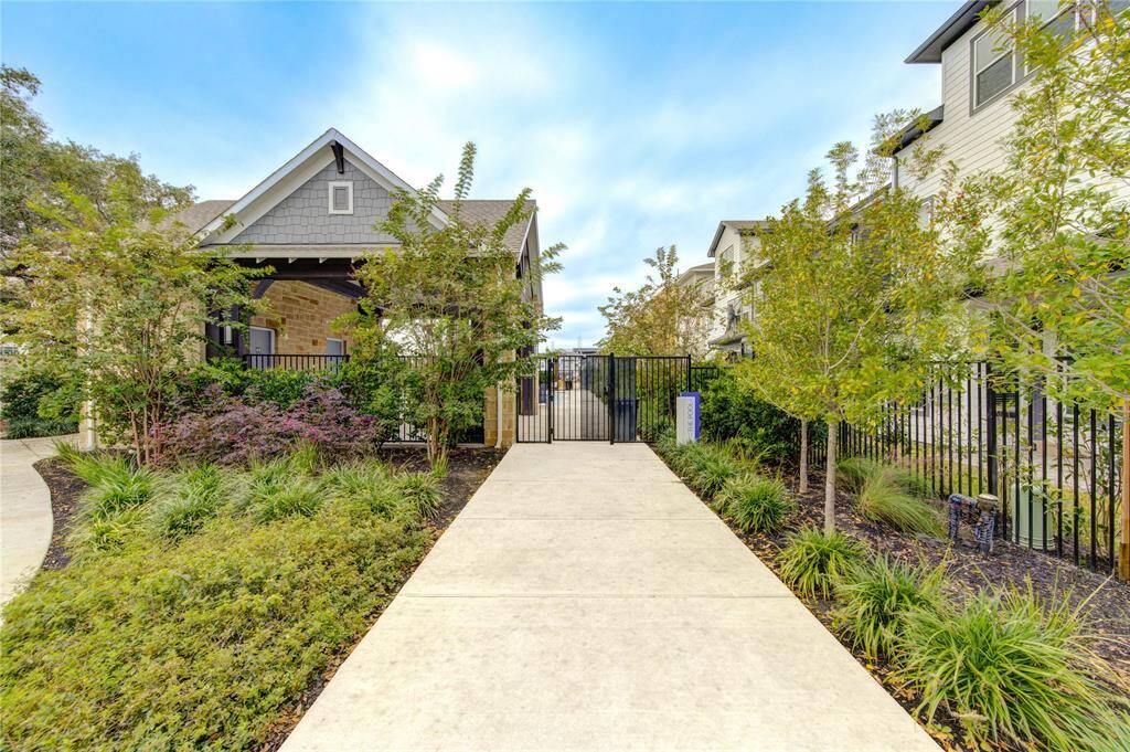 Located within a secure gated community, residents enjoy access to a refreshing community pool, as well as walking trails and parks.
