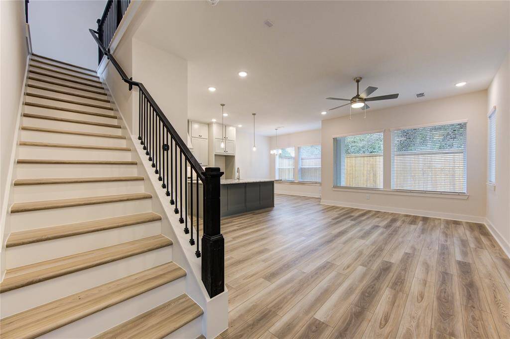 As you step inside, the foyer features high ceilings, a neutral color palette, and an open-concept design that creates a bright and airy entryway to the rest of the home. The space sets the stage for elegant living.