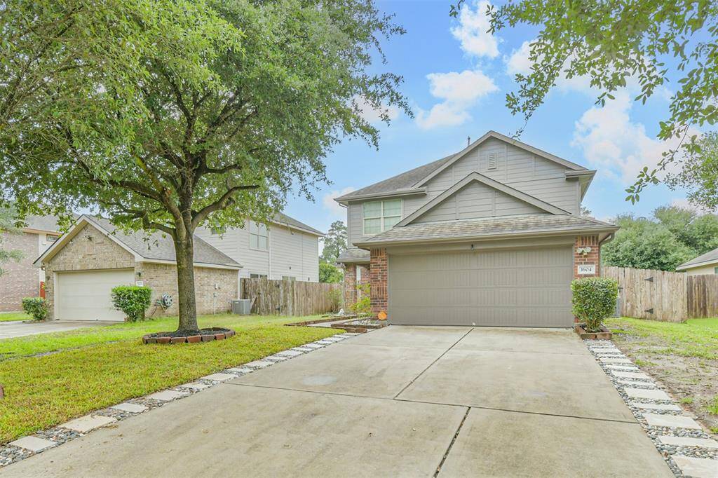 Welcome home! This beautifully maintained two-story offers great curb appeal with mature trees, updated landscaping, and a double-wide driveway leading to a spacious two-car garage.