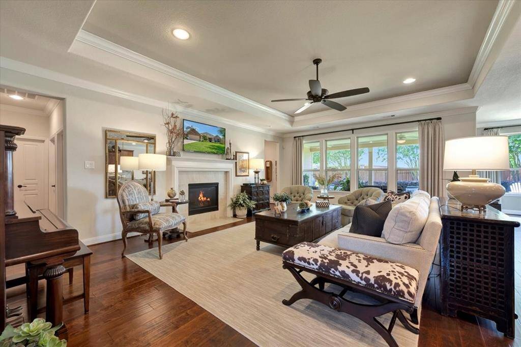 The gas log fireplace is the center of the family room making a cozy space during those chilly Texas nights.