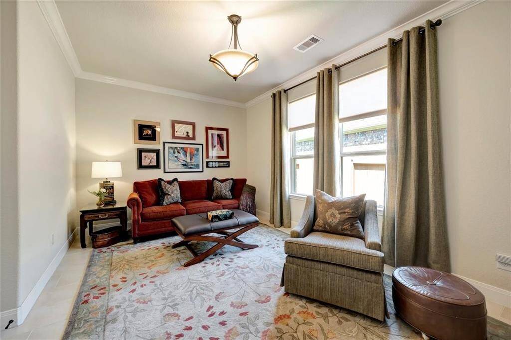 This is the 3rd bedroom currently used as a den.  This cozy space is perfect for quiet time or reading.  Make it what works for you!!