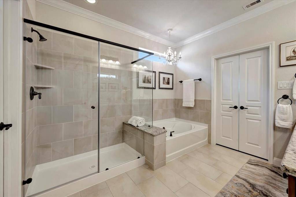 Oversize shower, separate tub and upgraded finishes.