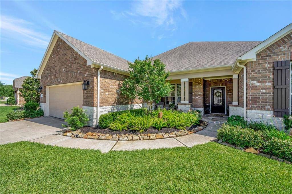 Immaculately maintained curb appeal – pristine landscaping and a home that shows pride of ownership.