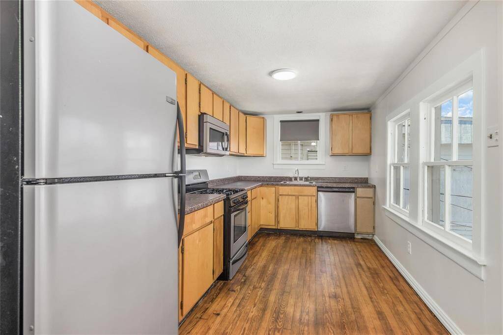 Modern kitchen on the second level of this spacious duplex.