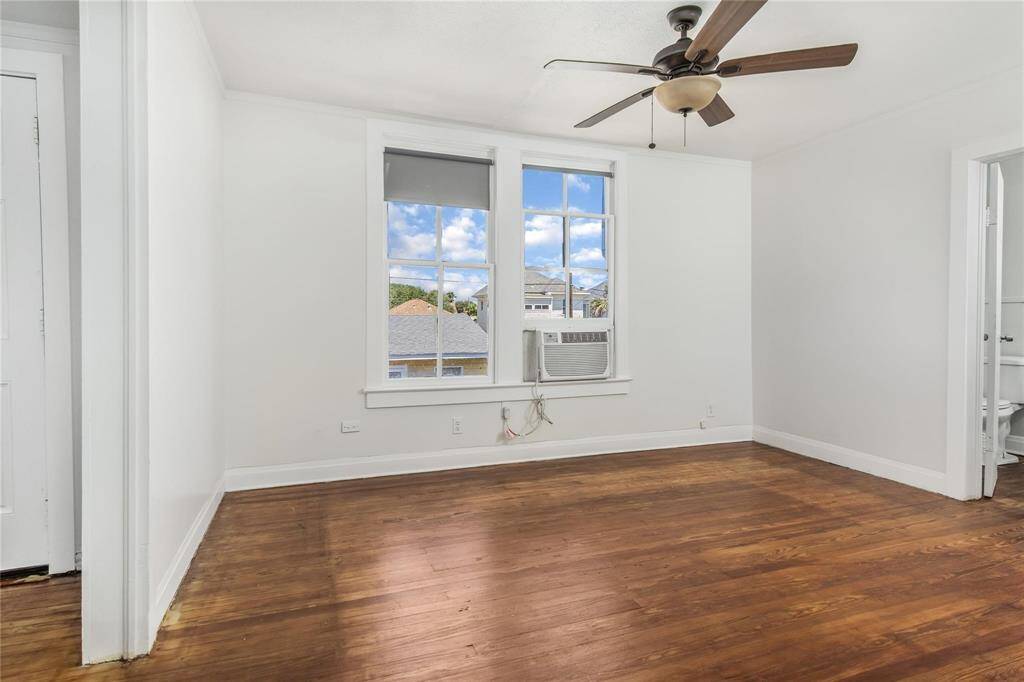 This level 2 bedroom 1 features beautiful hardwood floors and abundant natural light.