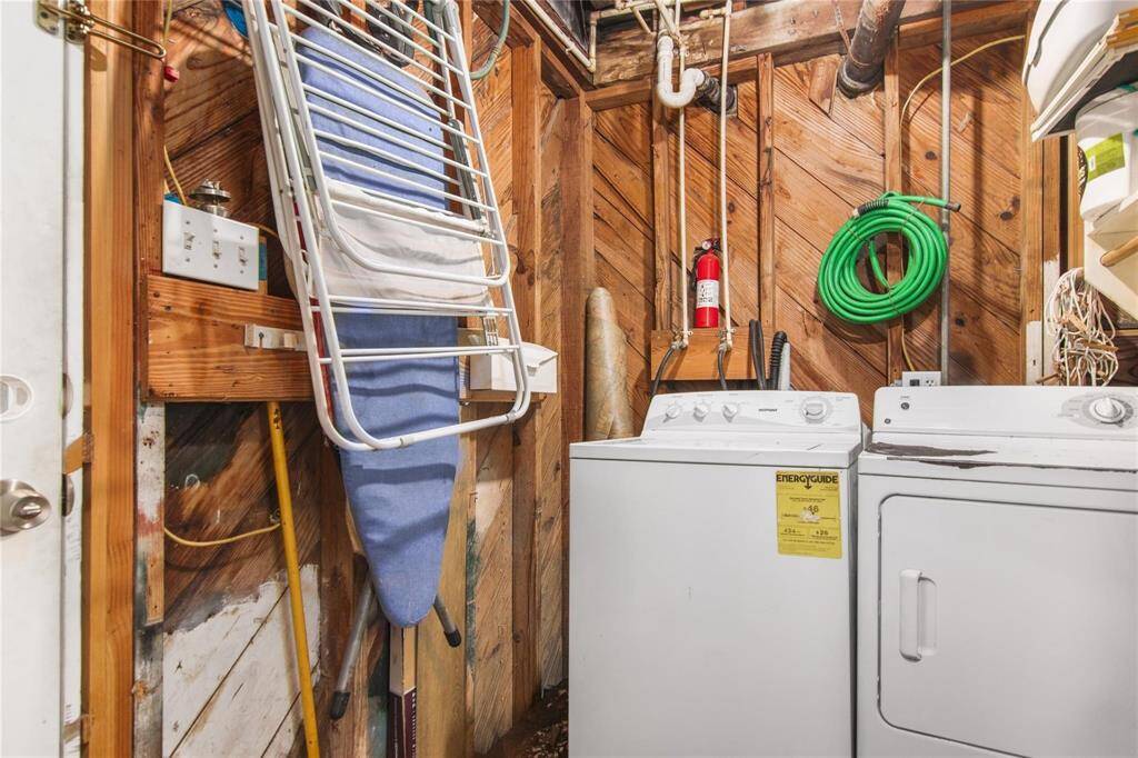 Conveniently shared laundry space with essential amenities for easy living.