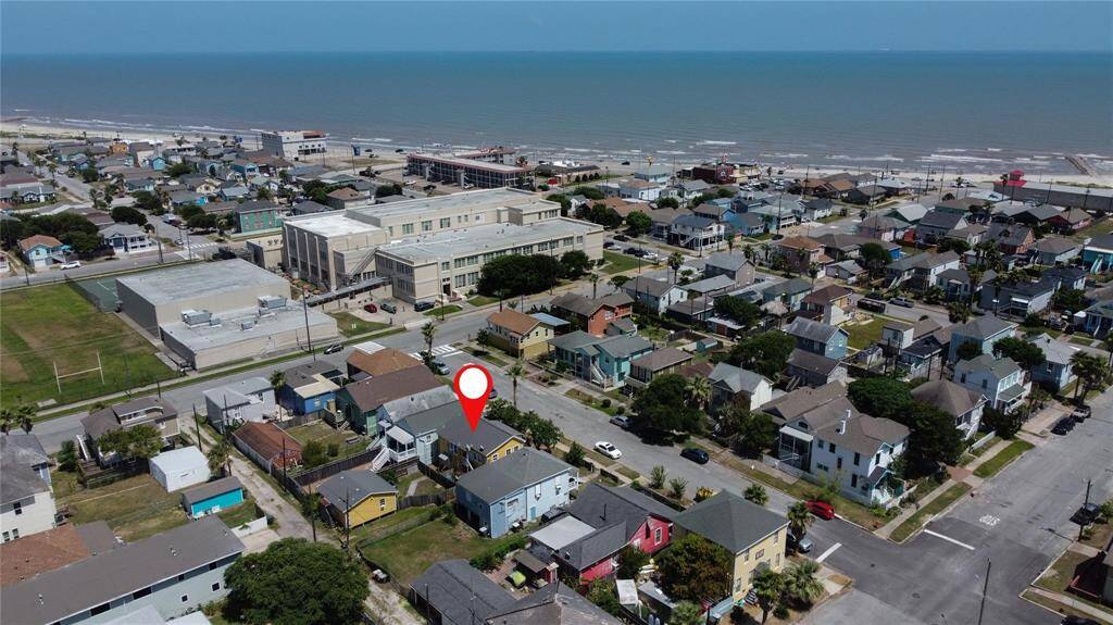 Prime location just three blocks from a stunning beach—an aerial view showcases the perfect coastal home!