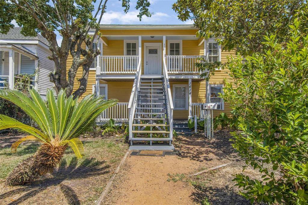 Charming dual-level home with separate upstairs and downstairs units, perfect for versatile living or rental opportunities.