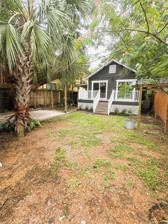 view of spacious backyard.