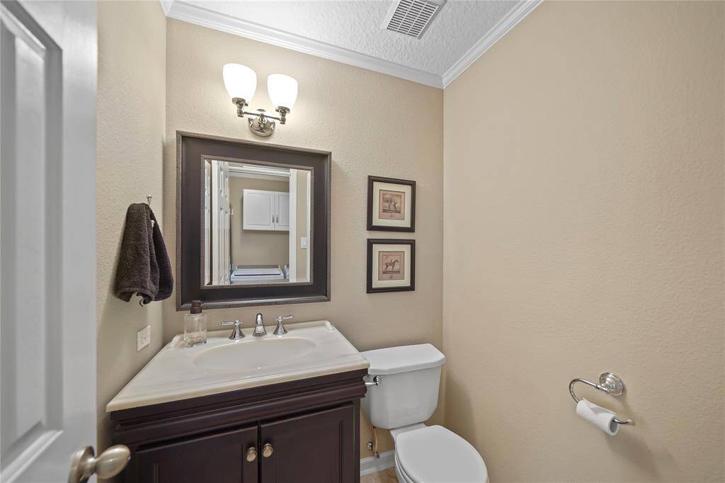 Half bath. Counter top is crushed marble.