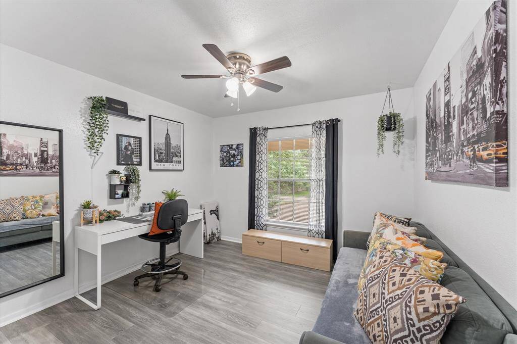 Three additional bedrooms plus an updated full bath provide flexibility for family or work-from-home needs