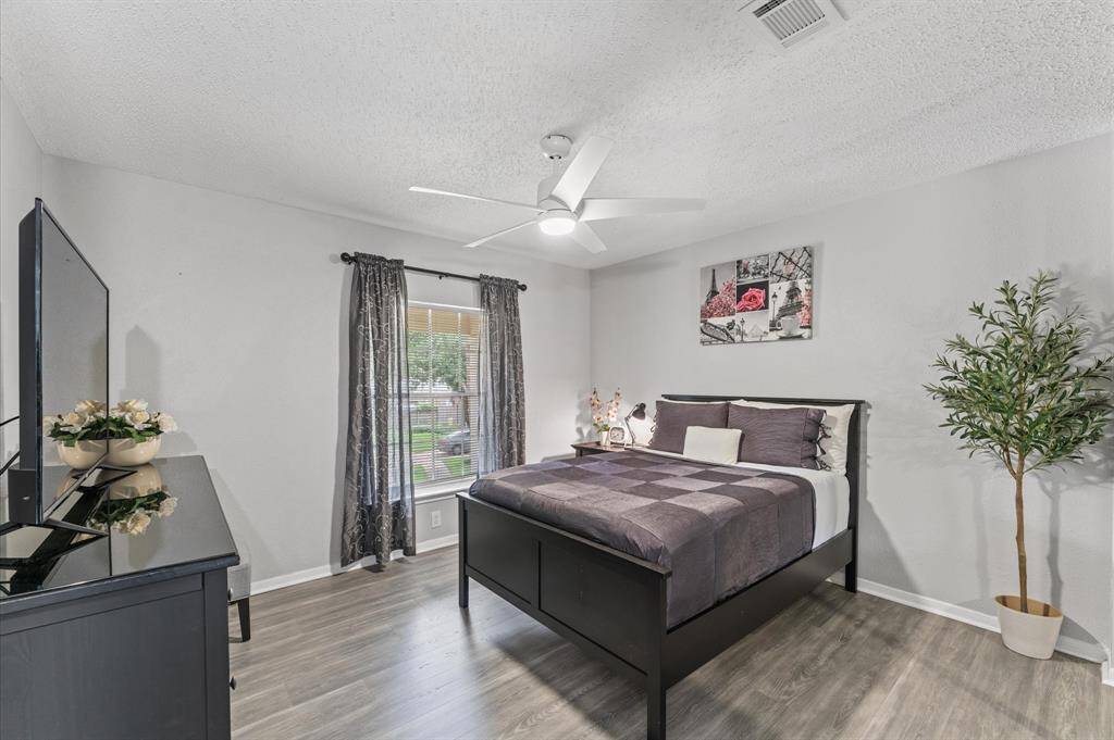 Three additional bedrooms plus an updated full bath provide flexibility for family or work-from-home needs