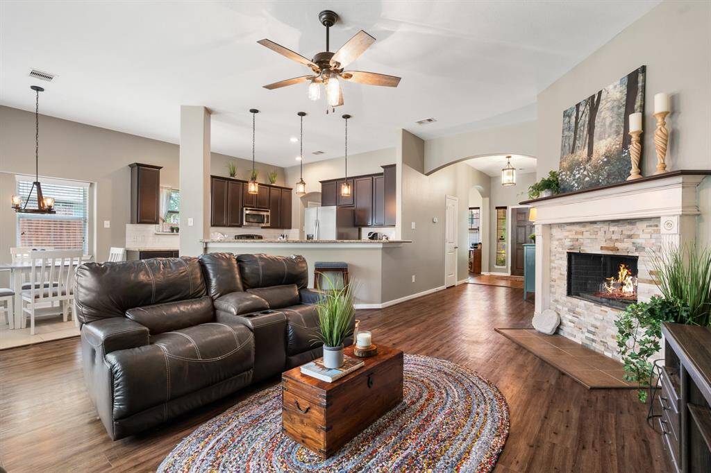 Spacious living room with wood-burning fireplace