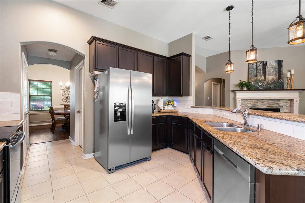 The kitchen is spacious and has granite countertops.