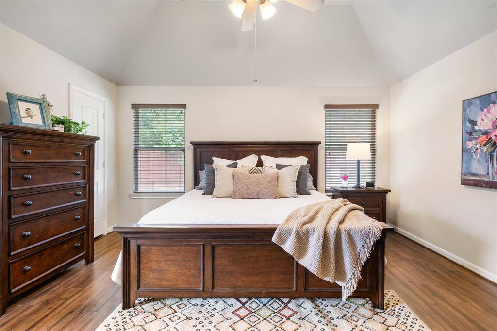 Primary bedroom overlooking the backyard