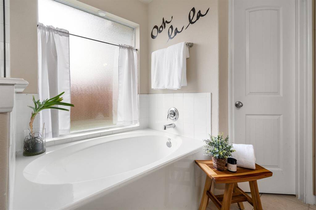 Primary bath with soaking tub and separate shower