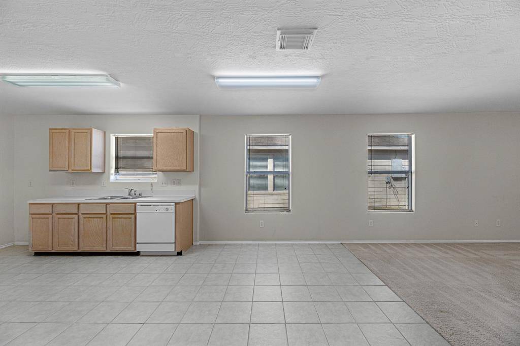 There is a breakfast nook off of the kitchen for an additional  dining area