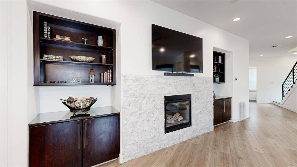 Lovely Fireplace is the focal point in this room