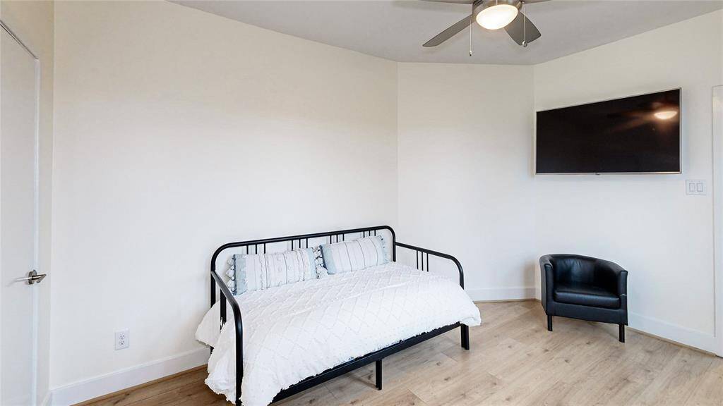 Another view of the secondary bedroom located on the third floor of home.