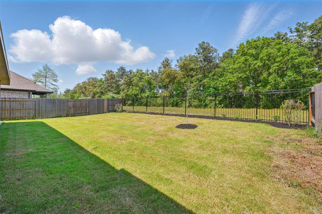 Iron fence offers long-lasting durability while maintaining an open design that lets you fully enjoy the beautiful backyard scenery.