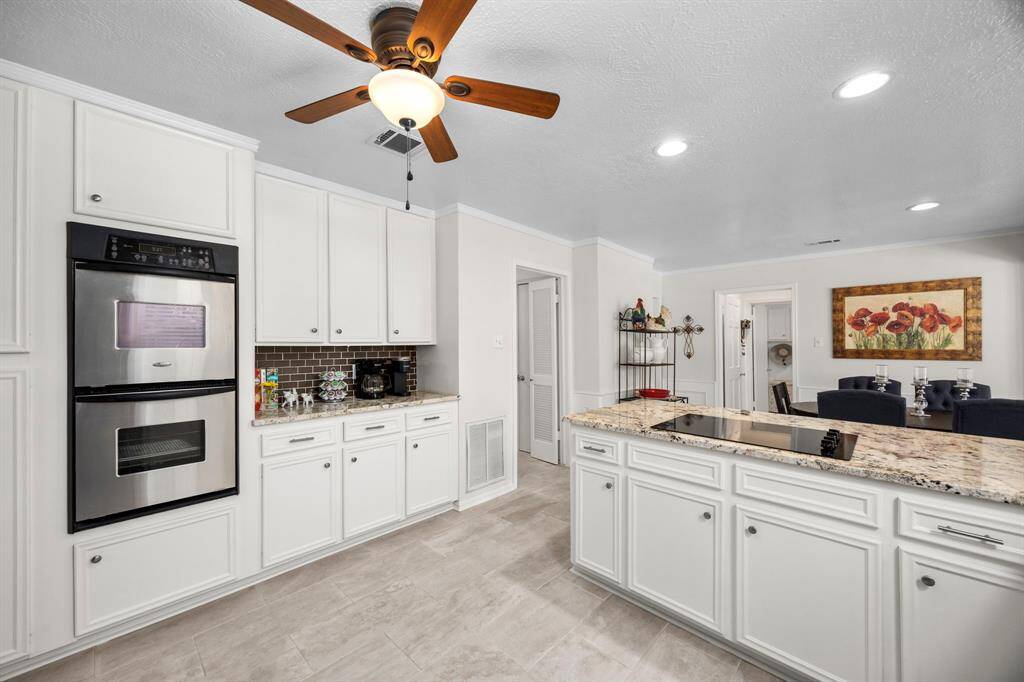 Viewed are double oven and extra counter space. Lots of storage space available!