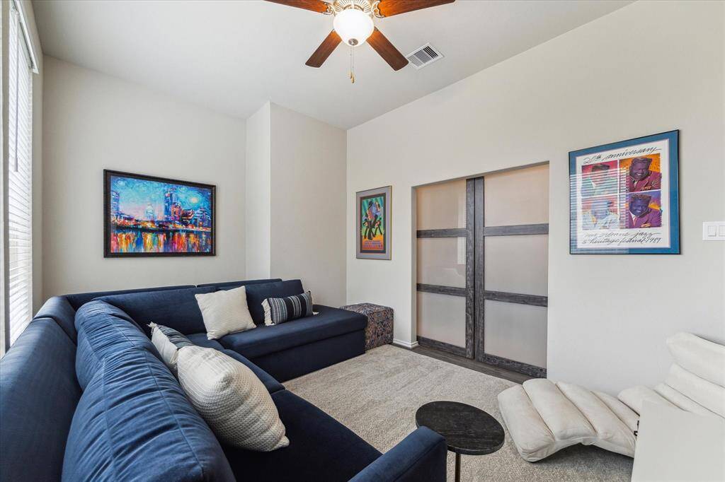 Chic sliding doors help keep the chaos in—or out—whether it's a rowdy game night with the family, client calls in your home office, or a peaceful yoga session to unwind.