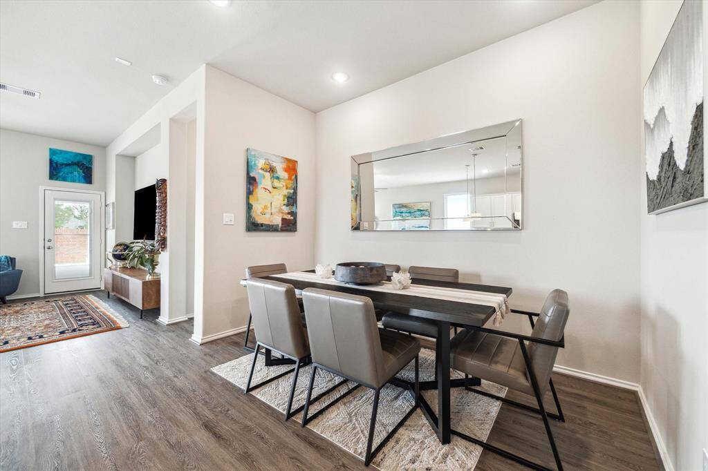 Gather them around your table to honor old traditions and create new ones. This elegant dining area is the perfect setting for hosting lavish dinner parties or enjoying romantic, candlelit dinners.