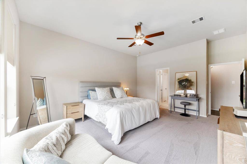 This expansive owner’s suite offers plenty of room for your oversized furniture, with space to comfortably fit a king-sized bed and a cozy sitting area creating the perfect spot to relax and recharge.