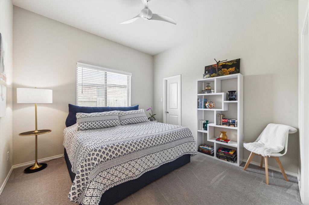 With two guest bedrooms, you will always have room for company. This welcoming retreat offers plush carpet, neutral paint, a modern fan, large closet and ensuite access to a full bathroom.