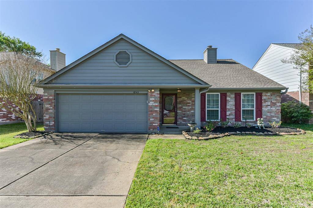 Charming single-story home with a brick facade and cozy front porch. Features a two-car garage, well-maintained lawn, and a simple garden. Perfect for a comfortable living environment.