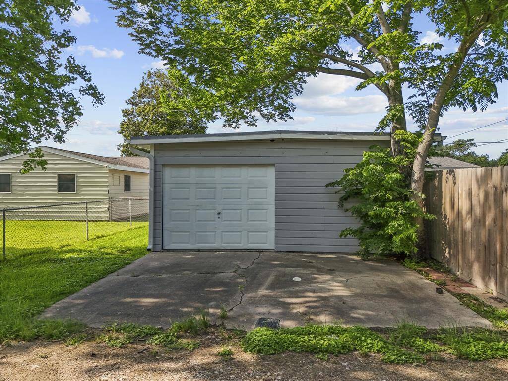 Oversized garage with back street access