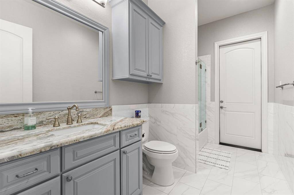 Beautiful bathroom with glass shower doors