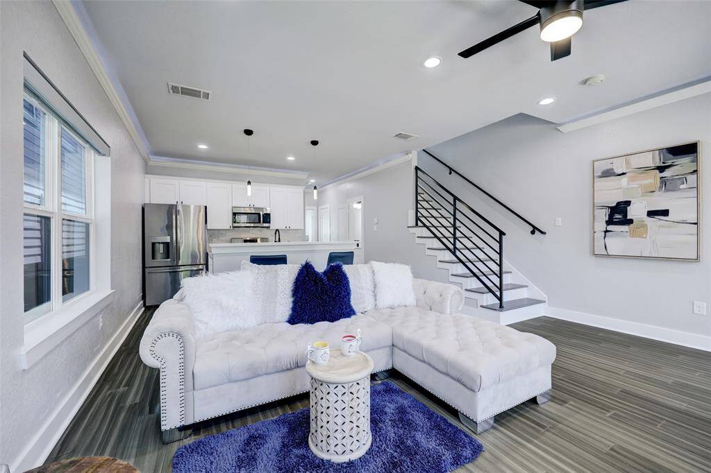 Open concept. Photos are staged. Property comes unfurnished.