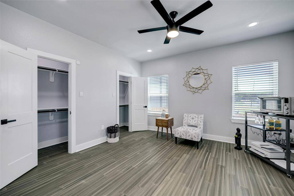 Secondary bedroom downstairs. Photos are staged. Property comes unfurnished.