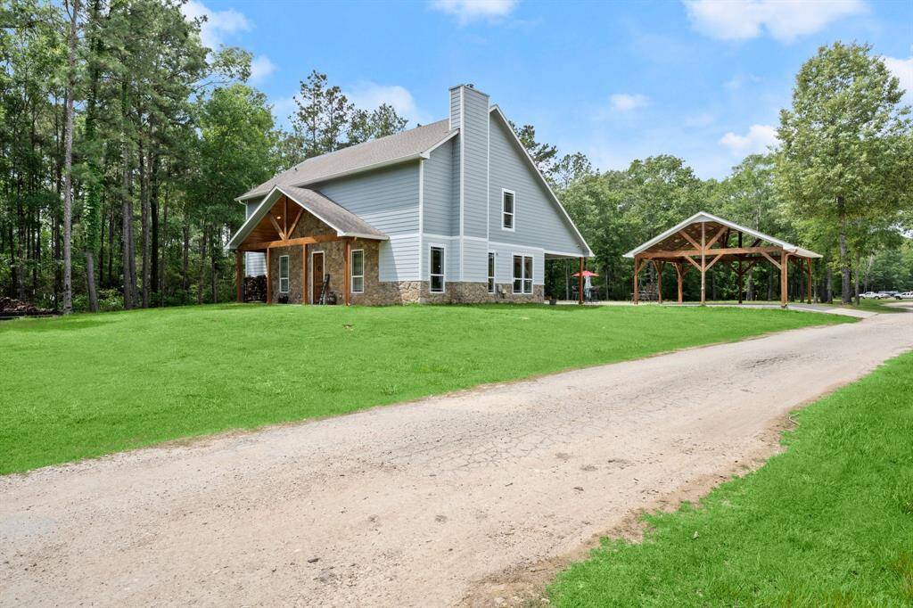 Stunning home surrounded by mature trees!