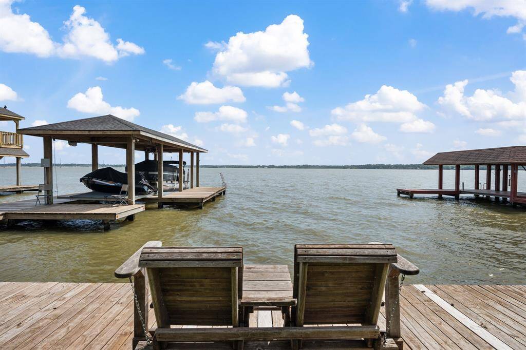 This is a rare opportunity to own a stunning, custom-reimagined luxury home in the prestigious Walden on Lake Houston