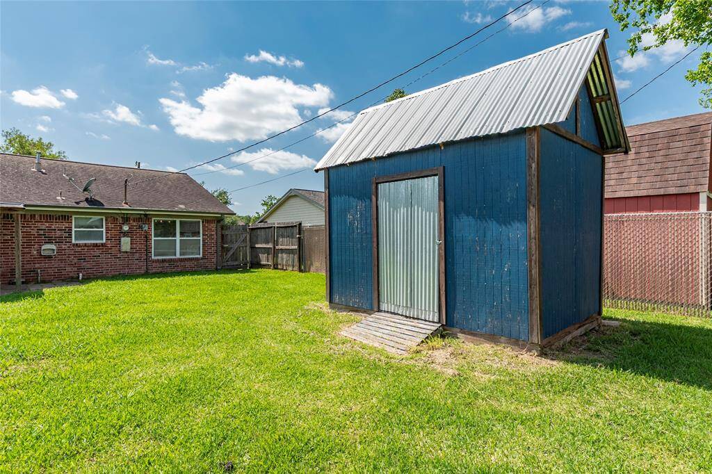Shed stays with the property. Store your lawn and garden equipment.