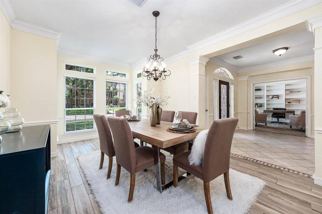 Elegant dining room seamlessly connected to the kitchen, perfect for family dinners and special occasions.