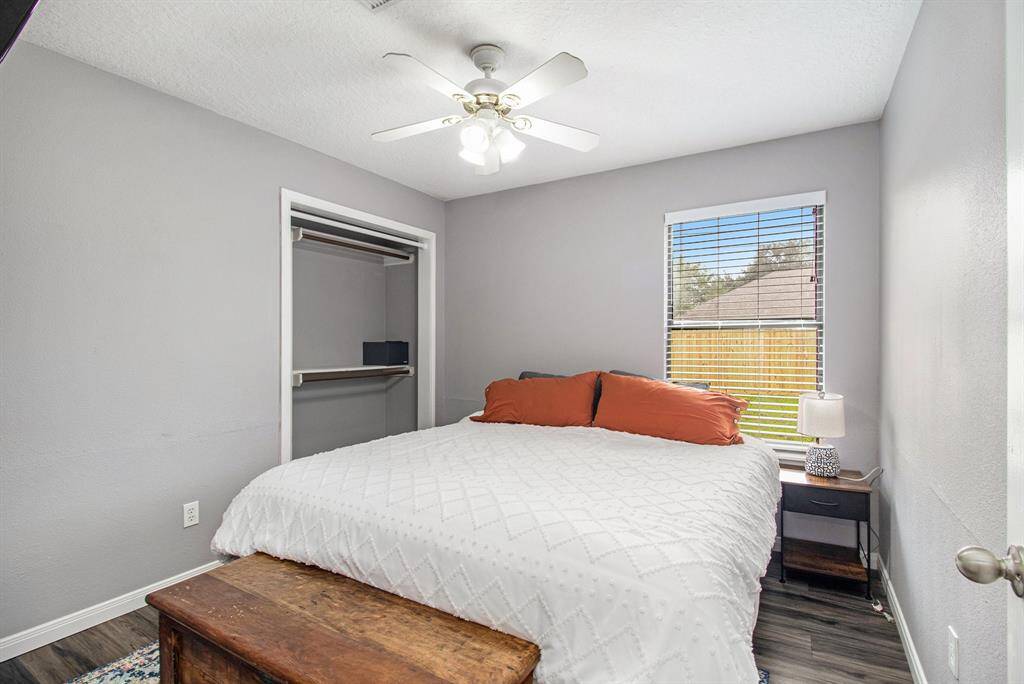 The 3rd bedroom is located at the end of the hallway and it's a great space for a quest room.