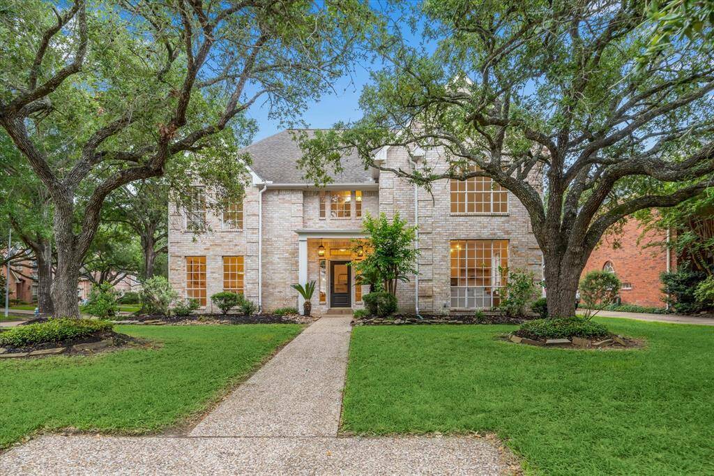 NESTLED IN THE COMMUNITY OF GREEN TRAILS AND SURROUNDED BY MATURE TREES, THIS MAJESTIC ESTATE HOME HAS BEEN UPDATED FOR THE DISCERNING BUYER.