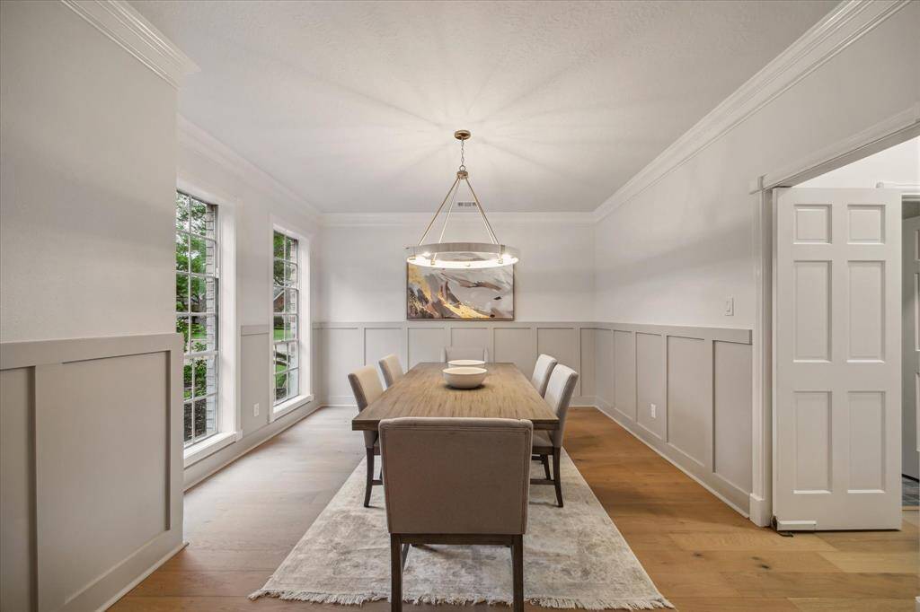 THE KITCHEN CAN BE CLOSED OFF WITH DUAL DOORS ON YOUR RIGHT.