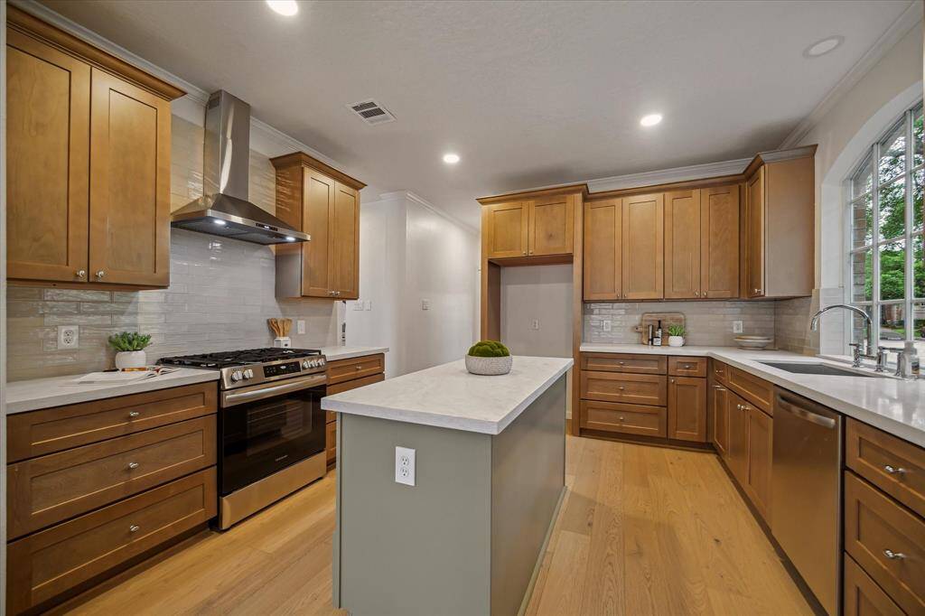 THIS KITCHEN IS BURSTING WITH STORAGE IN THE SHAKER CABINETS THROUGHOUT. KITCHEN WAS RENOVATED IN 2025 AND IS READY TO ENTERTAIN.