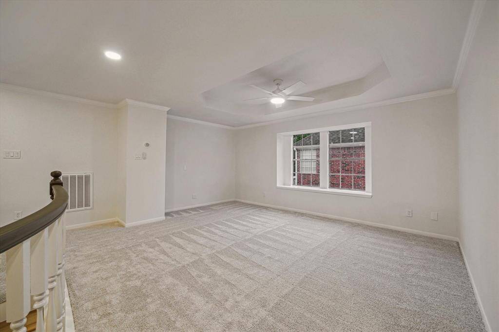 TIME FOR FAMILY FUN IN THE GAMEROOM. PLUSH NEW CARPET AND CEILING FAN CAN BE FOUND HERE.