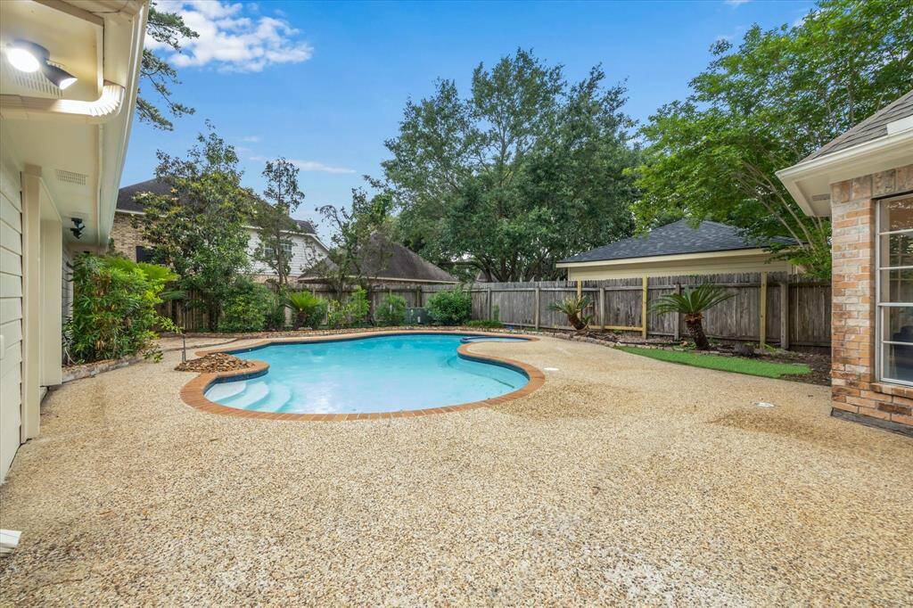 PLENTY OF PATIO SPACE FOR TANNING OR ENTERTAINING JUST OUT YOUR BACK DOOR.