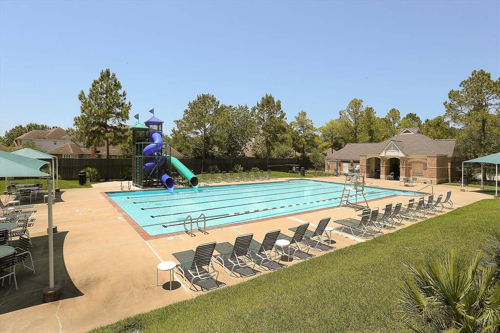 COMMUNITY POOL WITH SLIDES WILL BE A HIT WITH YOUR FAMILY.