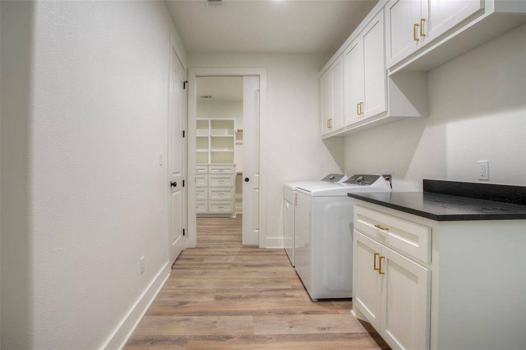 Utility room connects to the primary bedroom closet for convenience.